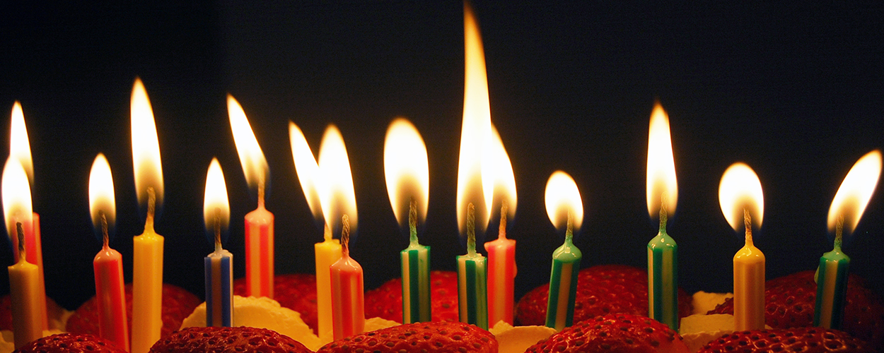 Birthday candles on a strawberry shortcake