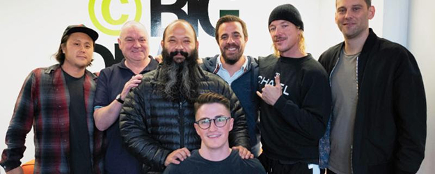 [L-R] Juba Lee, A&R, Mad Decent; Kenny MacPherson, CEO, Big Deal Music Group; Kevin Kusatsu, Diplo Manager/Business Partner; Jamie Cerreta, Co-Founder and Executive Vice President, Big Deal Music Group; Diplo; Casey Robison, Partner, Big Deal Music Group; Nate Olivas (kneeling), A&R, Mad Decent.